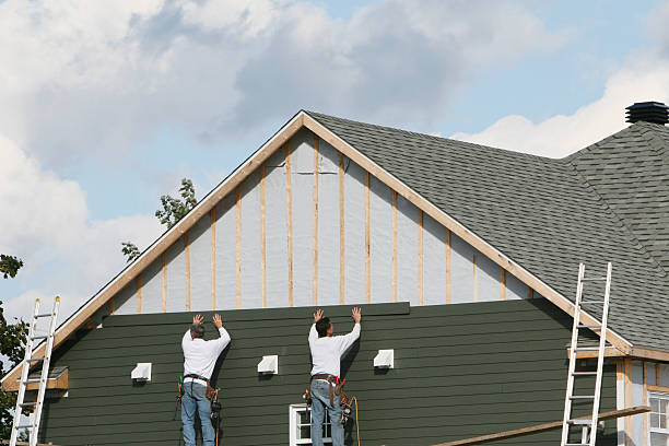 Professional Siding Contractor technician working in McLean, VA